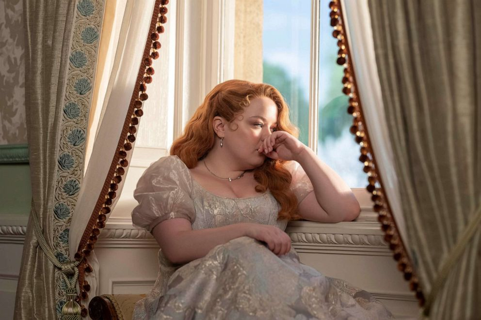 why does lady featherington dress penelope in yellow A 'Bridgerton' costume designer says Penelope's green dress in season 2 is a subtle nod to her and Colin's love story